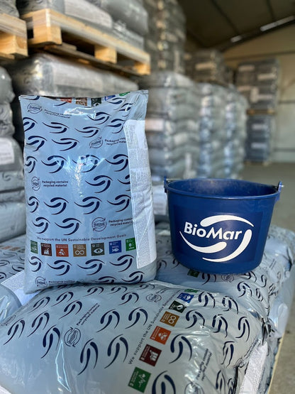 BioMar feed bags on pallets in a warehouse